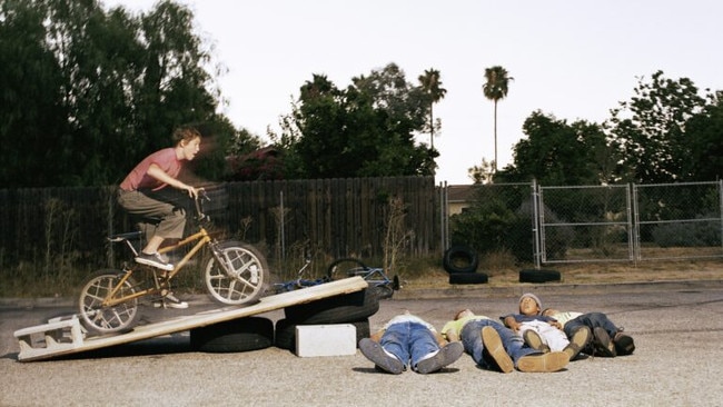 Think of the boy on the bike as the CPI info and the folks lying down as crypto users. Picture: Getty Images