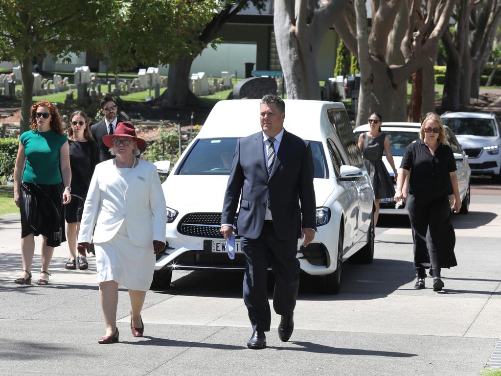 Ms Hoskins’ body arrived in a white hearse. Picture: NCA NewsWire/Philip Gostelow