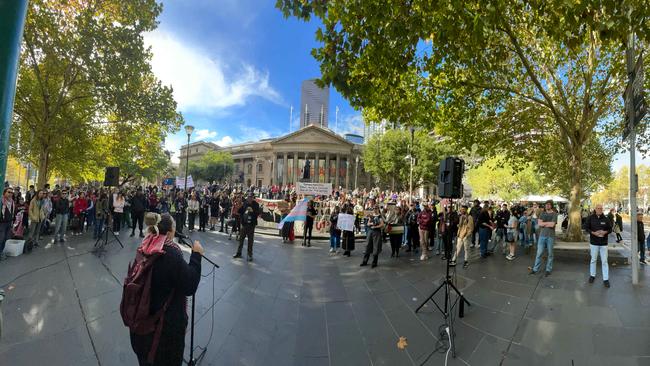 The group gathers outside the State Library. Picture: Valeriu Campan