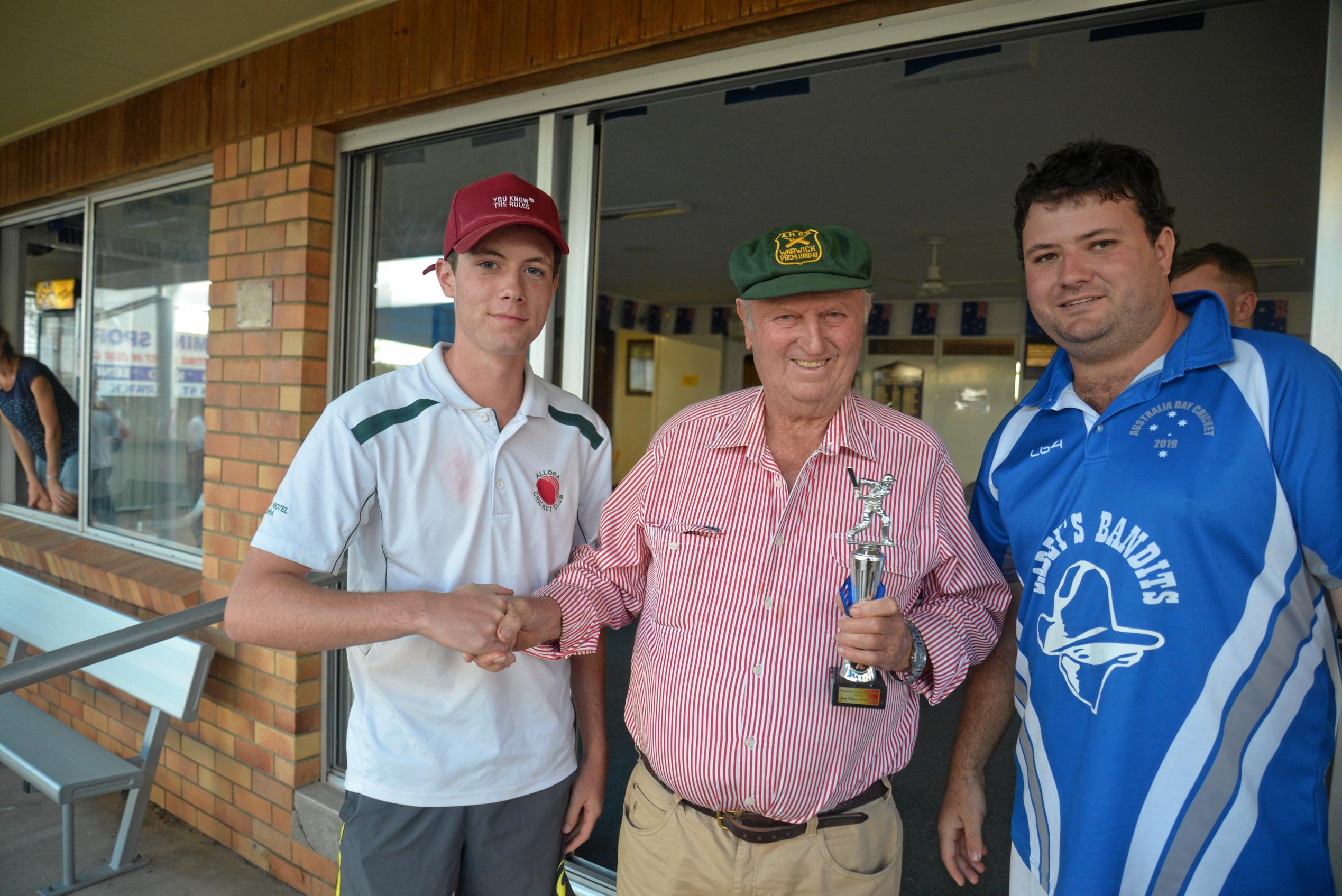 Sean Bryson (Allora) receives the representative player of the year award from patron Bill Gross and president Dave Walker. Picture: Gerard Walsh