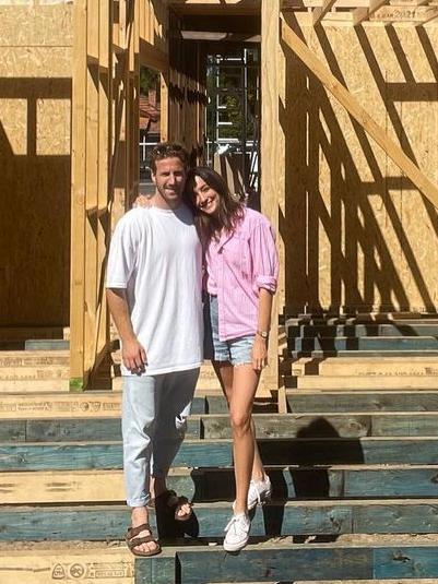 Lambert and Gelmi at their new build. Picture: Instagram