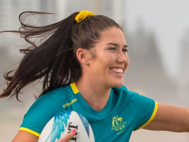 Charlotte Caslick and Emilee Cherry of the Australian Women's Sevens team on Nobby's Beach, Gold Coast, ahead of the 2018 Commonwealth Games. Photo: RUGBY.com.au/Stuart Walmsley