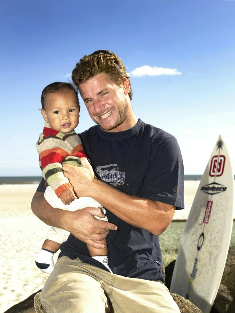 Mark Occhilupo with his son Jay at 11 months. Picture: Adam Ward