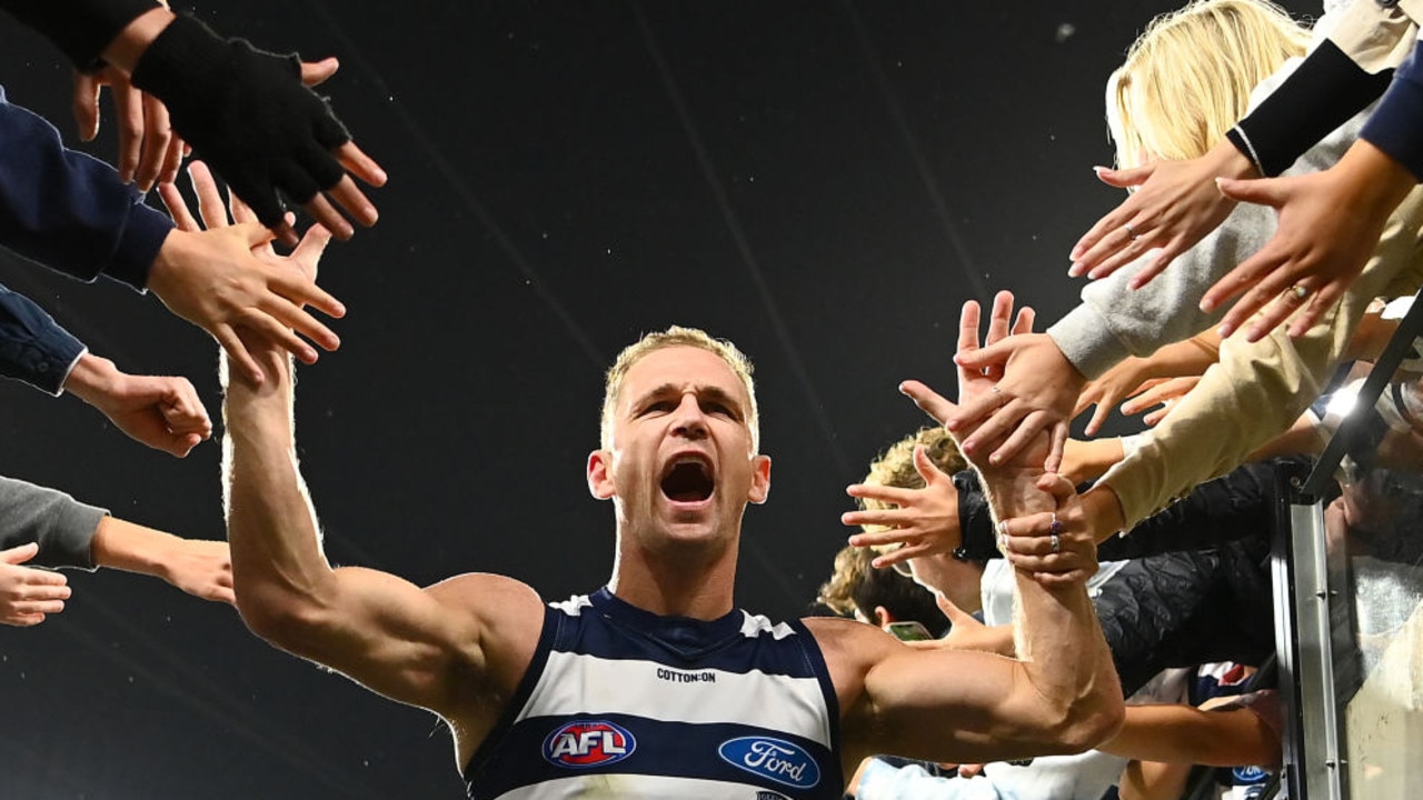 MELBOURNE, AUSTRALIA - APRIL 02: Joel Selwood of the Cats high fives fans after winning the round three AFL match between the Collingwood Magpies and the Geelong Cats at Melbourne Cricket Ground on April 02, 2022 in Melbourne, Australia. (Photo by Quinn Rooney/Getty Images)