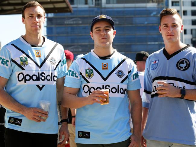 Sharks fans from L-R: Ryan Ilett, Sean Castro and Ethan Tudjman. Picture: Jonathan Ng