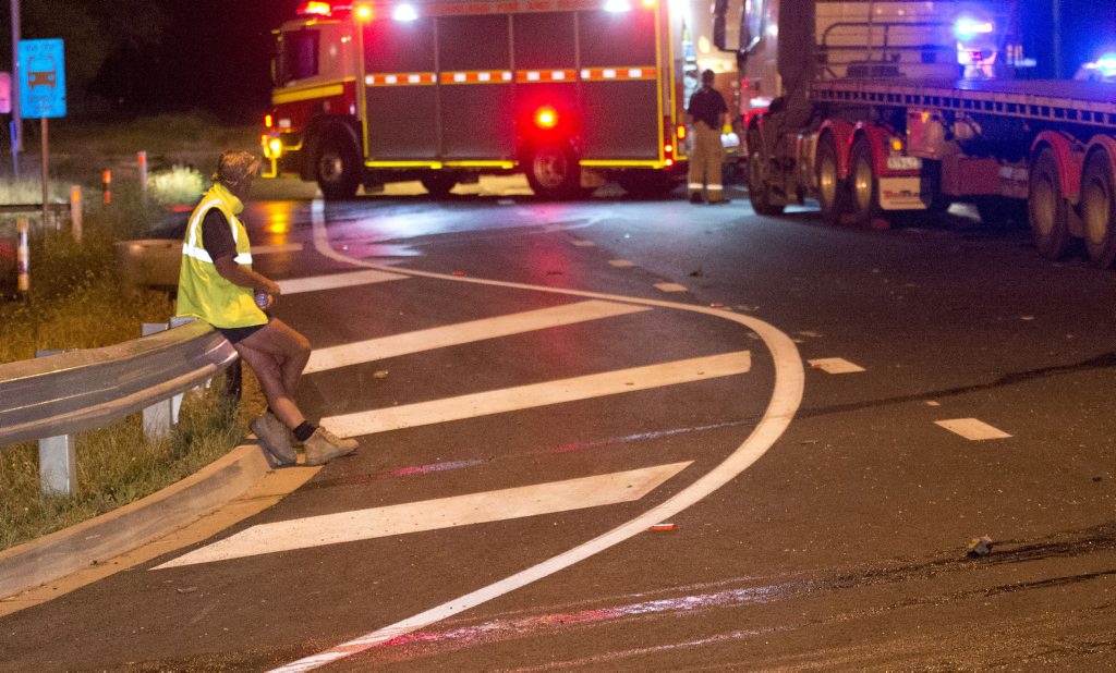 It was a tragic scene on the Warrego Hwy where a woman and two children were killed in a collision between a car and truck. Picture: Nev Madsen