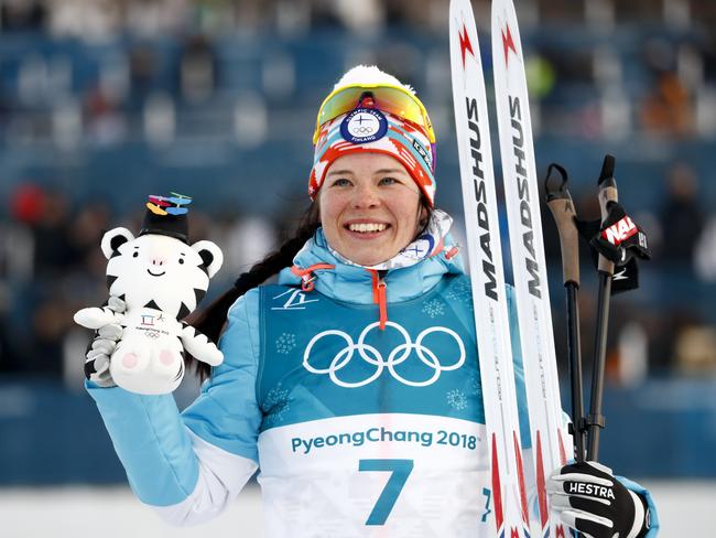 Bronze medal winner Krista Parmakoski, of Finland, poses during the winners ceremony after the women’s 7.5km skiathlon cross-country skiing competition. picture: Picture: Matthias Schrader/AP