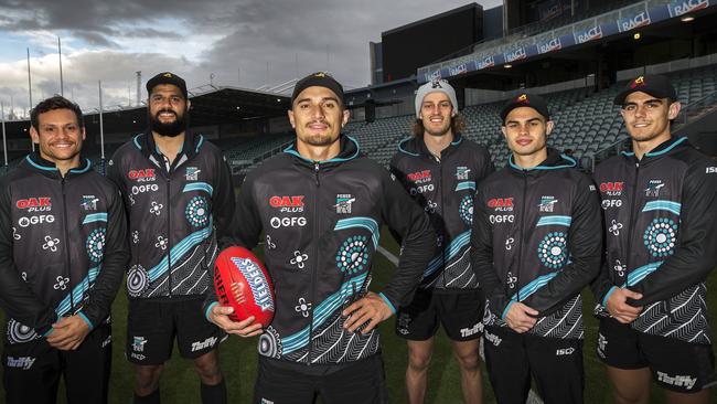 Port Adelaide’s indigenous players prepare for the Sir Doug Nicholls Round game against Hawthorn. From left, Steven Motlop, Paddy Ryder, Sam Powell- Pepper, Jarrod Lienert, Karl Amon and Joel Garner at UTAS Stadium. PICTURE CHRIS KIDD