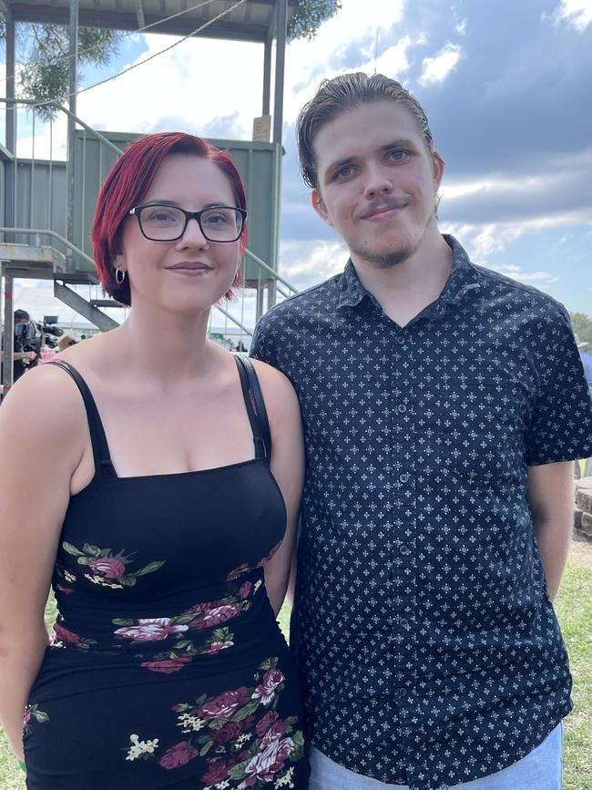 Dillon Cartner and Tayla Butcher having fun at the Torbanlea Picnic Races.