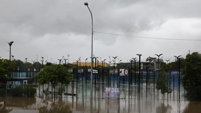 Flooding on the Gold coast in the aftermath of Cyclone Alfred. KDV Tennis complex goes under. Picture Glenn Hampson