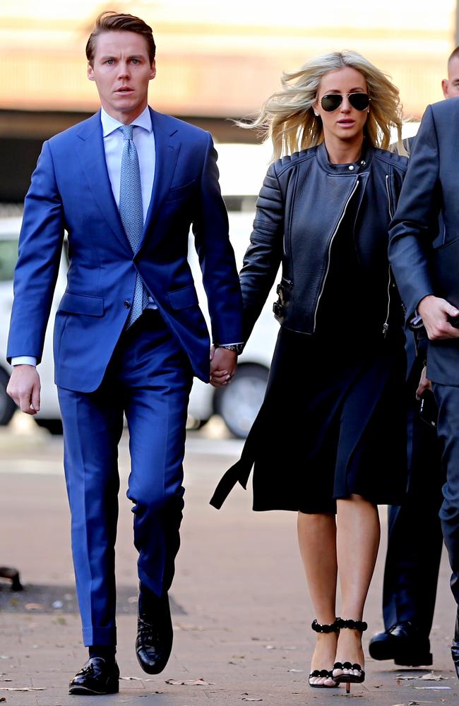 Oliver Curtis and Roxy Jacenko arrive hand in hand this morning. Picture: John Grainger