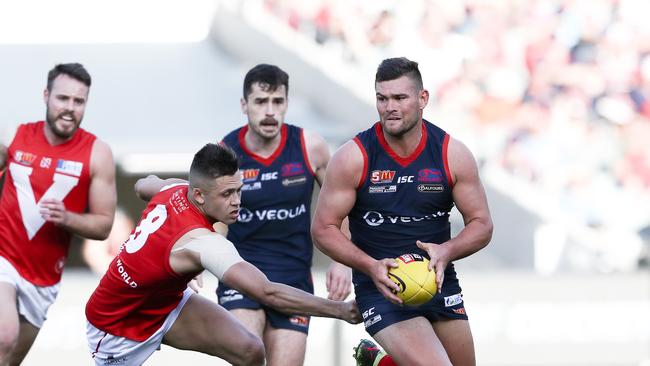 Mitch Grigg out runs Robbie Young in Norwood’s losing 2018 SANFL Grand Final. He was best on ground and won the Jack Oatey Medal. Picture Sarah Reed