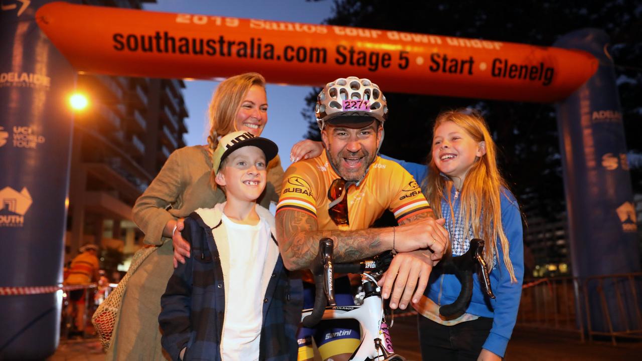 On Saturday 19 January 2019, Challenge Tour riders tackled the same route as the professional riders from Glenelg to Strathalbyn in the ultimate test of stamina. (L to R) Rob Yates (riding) with partner Rebecca Strugnell, and kids, son Ryder Hill, and daughter Maya Hill, from Adelaide. (AAP Image/Dean Martin)