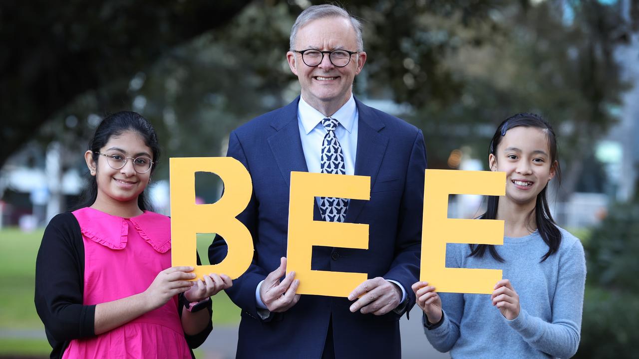 Prime Minister Anthony Albanese, with two of last year’s Prime Minister's Spelling Bee winners Theekshitha Karthik, 12, and Arielle Wong, 11, is encouraging kids to have a go at this year’s competition. Picture: David Caird