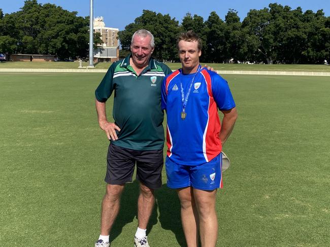 Newcastle representative cricketer Aaron Bills with Mark Curry after being awarded the Mark Curry Medal as man of the match of the final of the 2023/24 NSW Country Cricket Championships. Newcastle defeated Central Coast to claim to claim the side's fifth-straight title at Newcastle's No.1 Sportsground on December 10, 2023. Photo: Alex Pichaloff