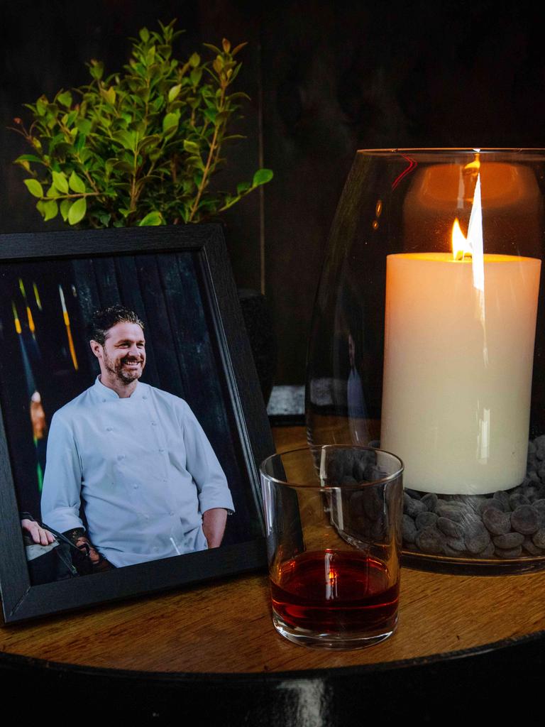 A candle, portrait and a whiskey as a memorial tribute to Zonfrillo at Mr Whiskers. Picture: Emma Brasier