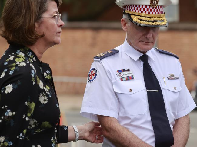 An emotional NSW Ambulance Commissioner Dominic Morgan, right, at the press conference on Friday. Picture: Tim Hunter