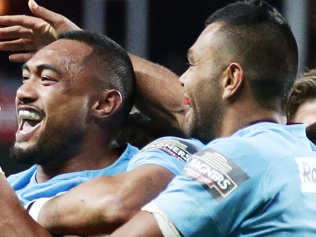 SYDNEY, AUSTRALIA - JULY 06: Sekope Kepu of the Waratahs celebrates with team mates after scoring a try during the round 18 Super Rugby match between the Waratahs and the Highlanders at Allianz Stadium on July 6, 2014 in Sydney, Australia. (Photo by Matt King/Getty Images)