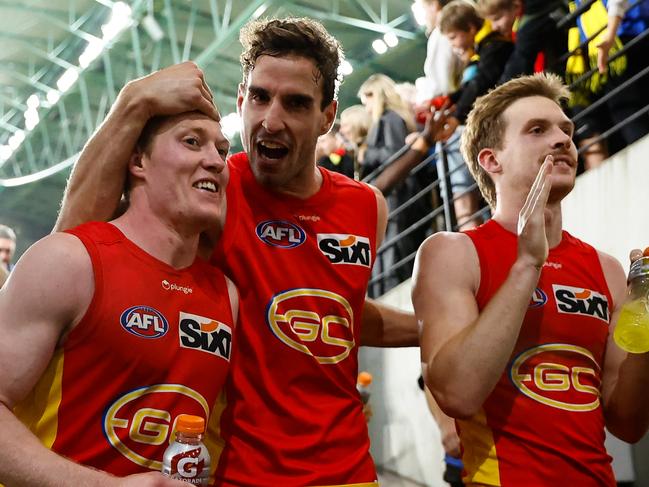 MELBOURNE, AUSTRALIA - APRIL 30: Matt Rowell, Ben King and Noah Anderson of the Suns leave the field during the 2023 AFL Round 07 match between the Richmond Tigers and the Gold Coast Suns at Marvel Stadium on April 30, 2023 in Melbourne, Australia. (Photo by Dylan Burns/AFL Photos via Getty Images)