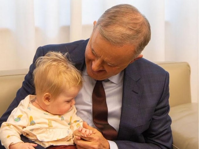 Anthony Albanese as opposition leader during last year's election campaign, posing with baby Leo who has the rare condition Pompe disease which Labor promised to include in an expanded program of newborn screening