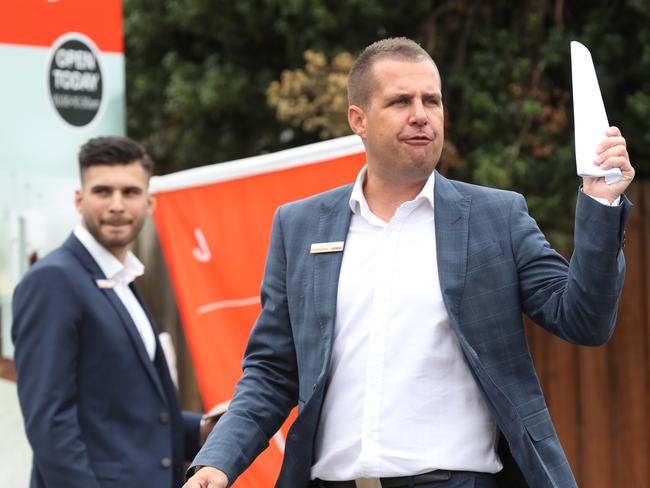 Tate Moore auctioneer. Seddon couple Tam and Anthony Bulloch, who abandoned plans to sell their home as Melbourne's tough, weeks long stage-four lockdown tanked the city's property market have sold their home today. Saturday, FEBRUARY 27, 2021. Picture: David Crosling