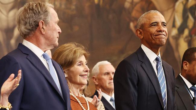 Former president George W. Bush, former first lady Laura Bush and former president Barack Obama arrive for the inauguration. Picture: AFP