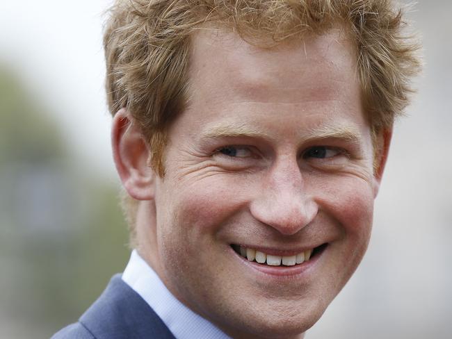 Britain's Prince Harry smiles as he attends the presentation ceremony at the 35th London Marathon, Sunday, April 26, 2015. (AP Photo/Kirsty Wigglesworth)