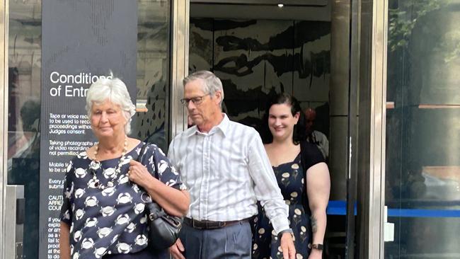 David Nairn leaves the County Court alongside his wife Dr Catherine Urie and her daughter Claire Barnier after the sentencing of Ismail Abdi and Mohamed Salad.