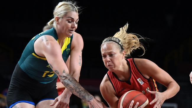 Australia's Cayla George (L) fights for the ball with Belgium's Julie Allemand in the women's preliminary round group C basketball match between Australia and Belgium during the Tokyo 2020 Olympic Games. Picture: Aris Messinis – AFP)