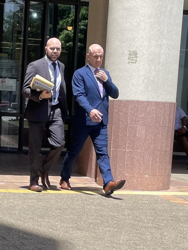 Skipper Joseph William Sloan, 50, (right) leaves court with lawyer Tom Mohun after pleading guilty to dangerous operation of a vessel over a 2024 accident in Trinity Inlet where a Bad Fishy jet boat collided with a dinghy, injuring the family of three fishing from the dinghy.