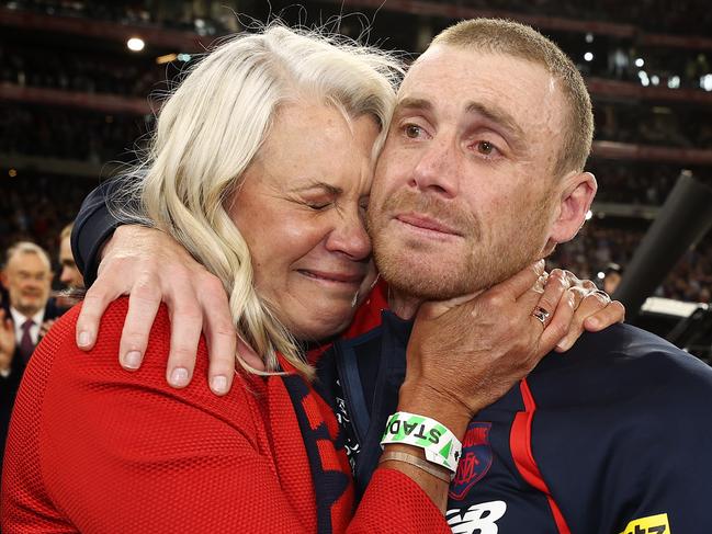 PERTH. 25/09/2021. AFL Grand Final. Melbourne vs Western Bulldogs at Optus Stadium, Perth. . An emotional Simon Goodwin, senior coach of the Demons hugs president Kate Roffey after game . Photo by Michael Klein