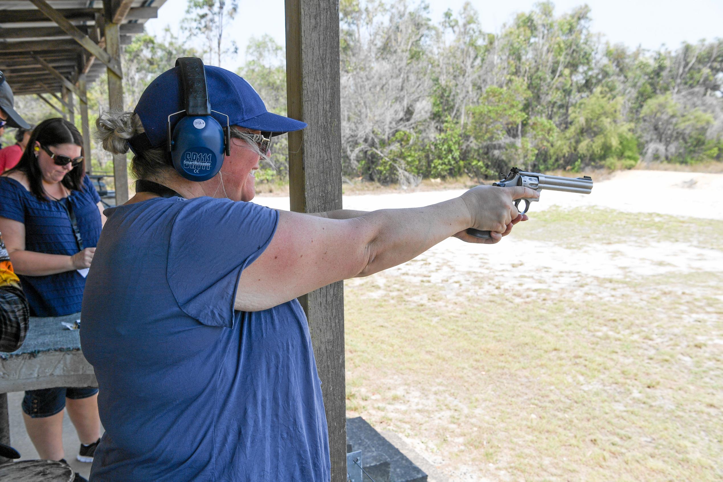 Make my day. Melinda Peters shoots a Smith and Wesson 22. Picture: Brian Cassidy