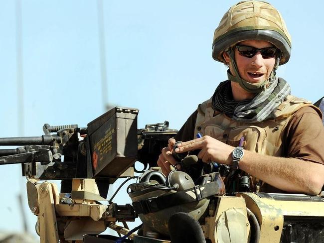 Prince Harry atop a military vehicle in the Helmand province, Southern Afghanistan in 2008.