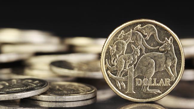 Australian dollar coins on a dark reflective background. Picture: iStock