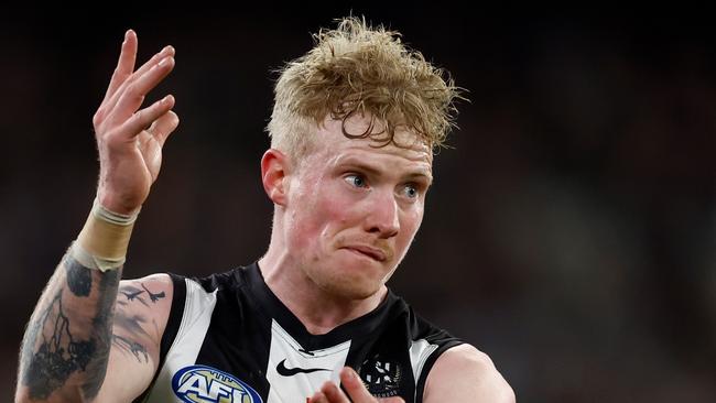 MELBOURNE, AUSTRALIA - AUGUST 17: John Noble of the Magpies kicks the ball during the 2024 AFL Round 23 match between the Collingwood Magpies and the Brisbane Lions at The Melbourne Cricket Ground on August 17, 2024 in Melbourne, Australia. (Photo by Michael Willson/AFL Photos via Getty Images)