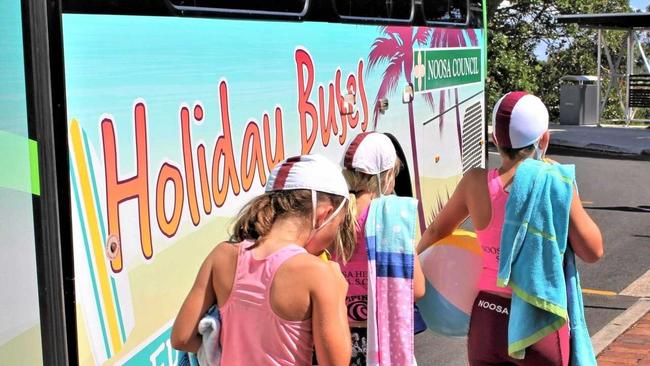 ALL ABOARD: The Noosa nippers headed to the beach the travel smart way on a free holiday bus over Christmas. Picture: Contributed