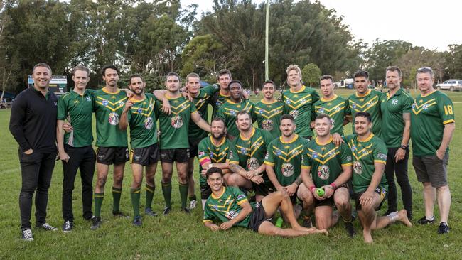 Sam Burgess (left) celebrates victory with the Orara Valley Axemen.