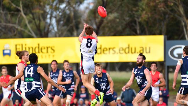 Mitch Johnson flies for the Falcons against Noarlunga. Picture: Keryn Stevens