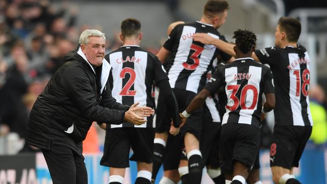 Newcastle manager Steve Bruce leads the celebrations after Newcastle’s equaliser.