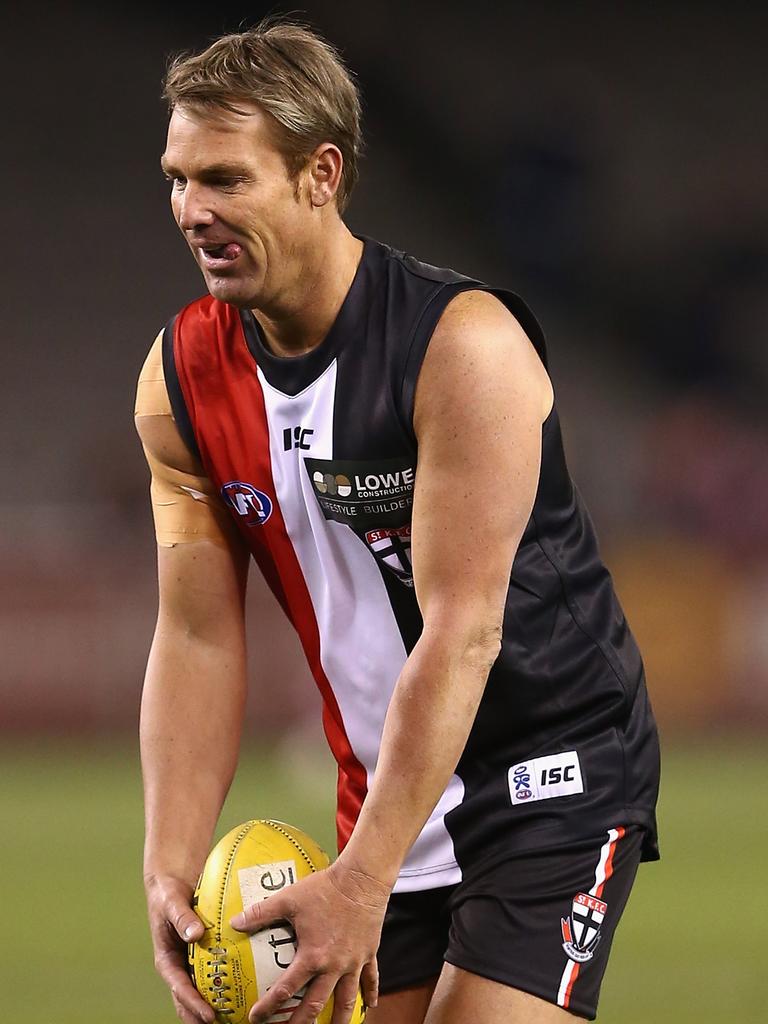 Shane Warne kicks during the St Kilda Thank You Round charity match at Etihad Stadium on August 25, 2012 in Melbourne. Picture: Getty Images