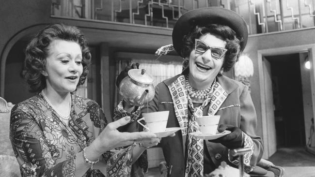 Joan Plowright having tea with Australian housewife superstar Dame Edna Everage, at the Lyric Theatre in London, 1976.