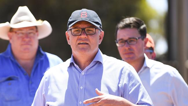 Prime Minister Scott Morrison speaks to the media during a visit to Bunginderry Station outside Quilpie. Picture: AAP Image/Lukas Coch via NCA NewsWire.