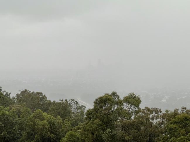 The Brisbane CBD was barely visible from the Mt Coot-tha lookout yesterday afternoon. Supplied.