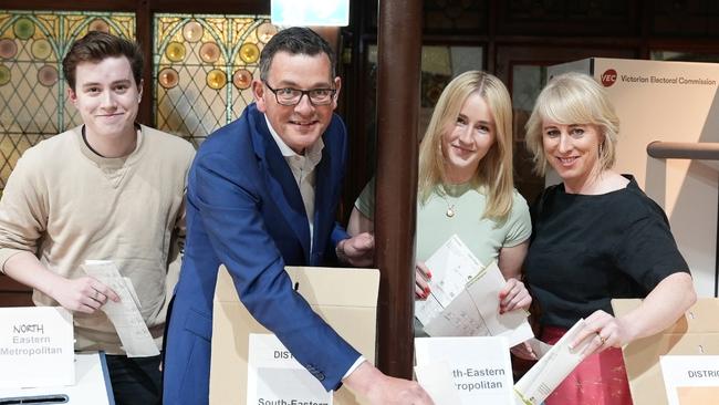 Daniel Andrews voting in the state election with his wife and two of his children.