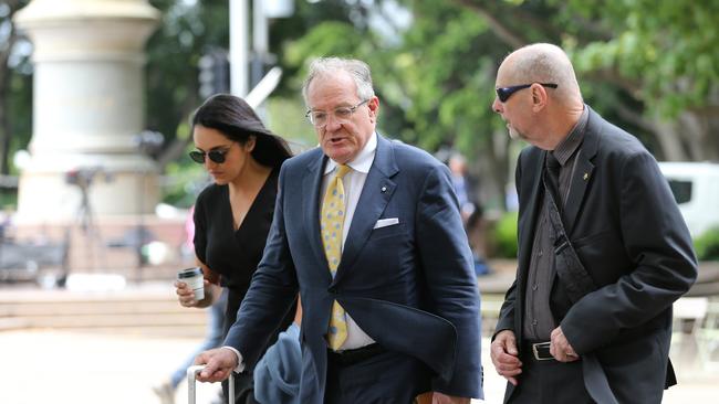 Peter Dawson (right) arrives at court with Greg Walsh SC. Picture: Britta Campion