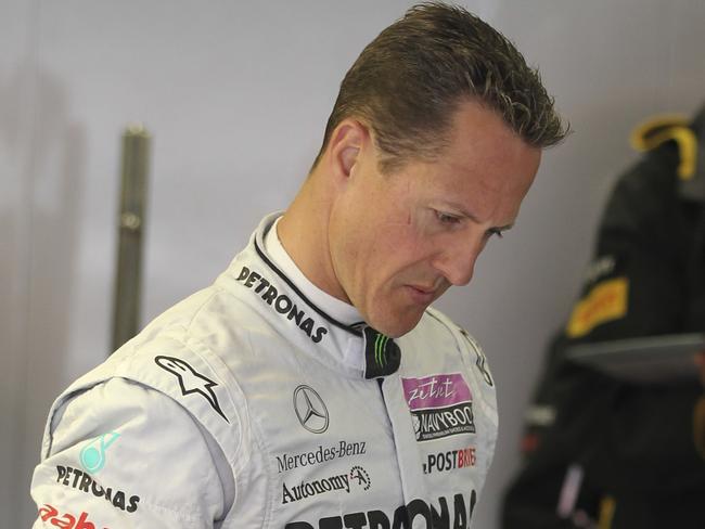 Mercedes Grand Prix driver Michael Schumacher of Germany looks on in the pit during the first free practice at the Istanbul Park circuit racetrack, in Istanbul, Turkey, Friday, May 6, 2011. The Formula One race will be held on Sunday. (AP Photo/Thanassis Stavrakis)