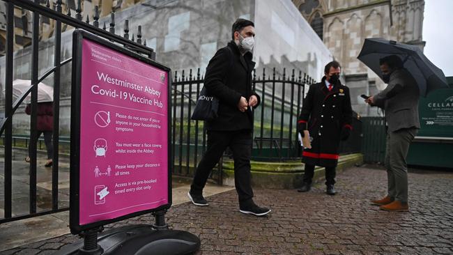 A man leaves from a temporary COVID-19 vaccination centre set up inside Westminster Abbey in London. Picture: AFP