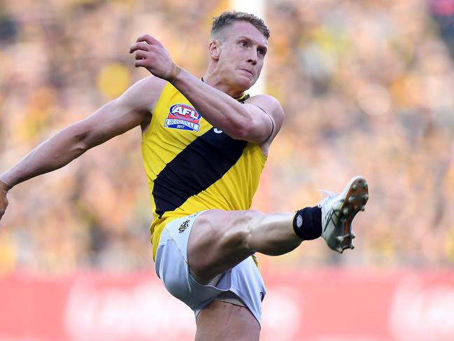 Josh Caddy of the Tigers is seen in action during the AFL grand final between the Adelaide Crows and Richmond Tigers at the MCG in Melbourne, Saturday, September 30, 2017. (AAP Image/Julian Smith) NO ARCHIVING, EDITORIAL USE ONLY