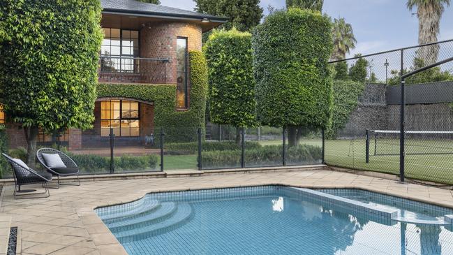 The swimming pool and tennis court.