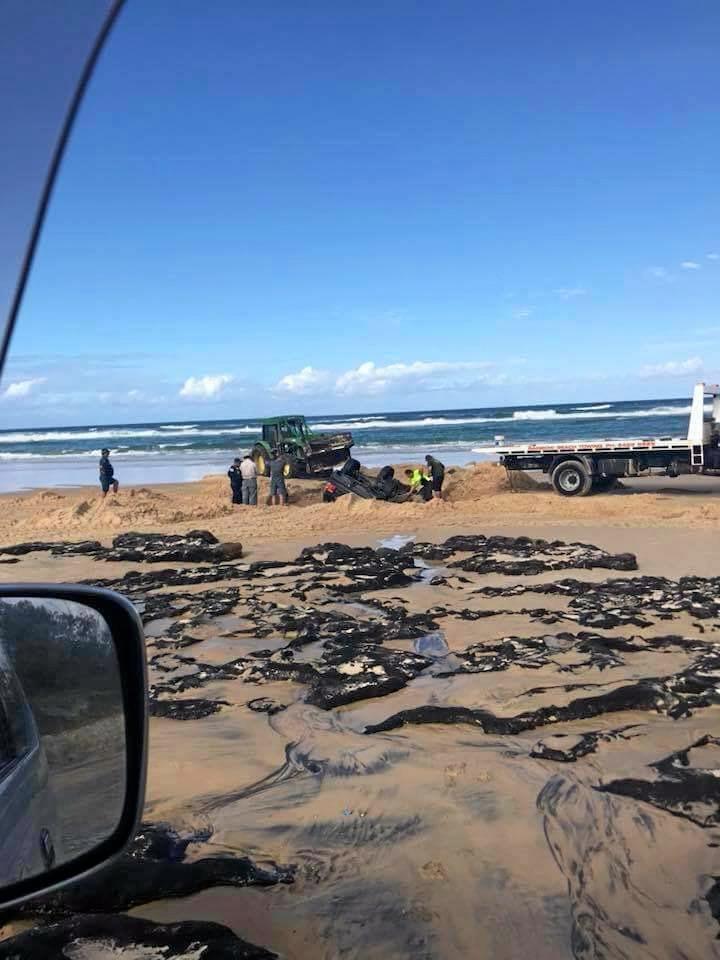 The high tide claimed a Range Rover on Fraser Island. These photos were posted to the I Got Bogged at Inskip Point Facebook page.